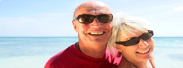 holiday couple with sun glasses