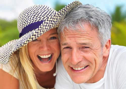 over 50s couple looking happy